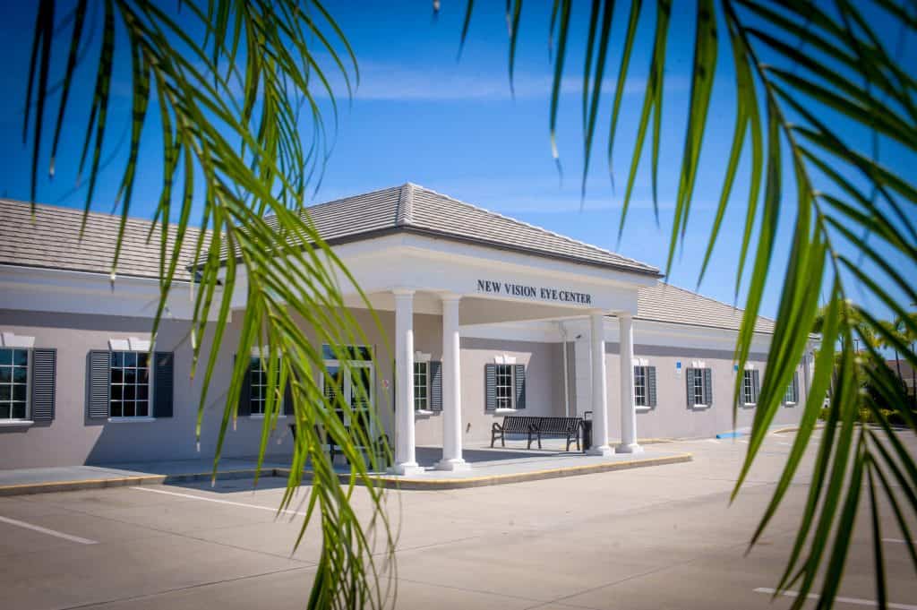 New Vision Eye Center Front Entrance through Palm Trees